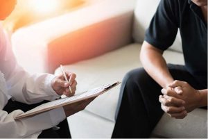 A sleep consultant discussing health issues with a patient in Cleveland